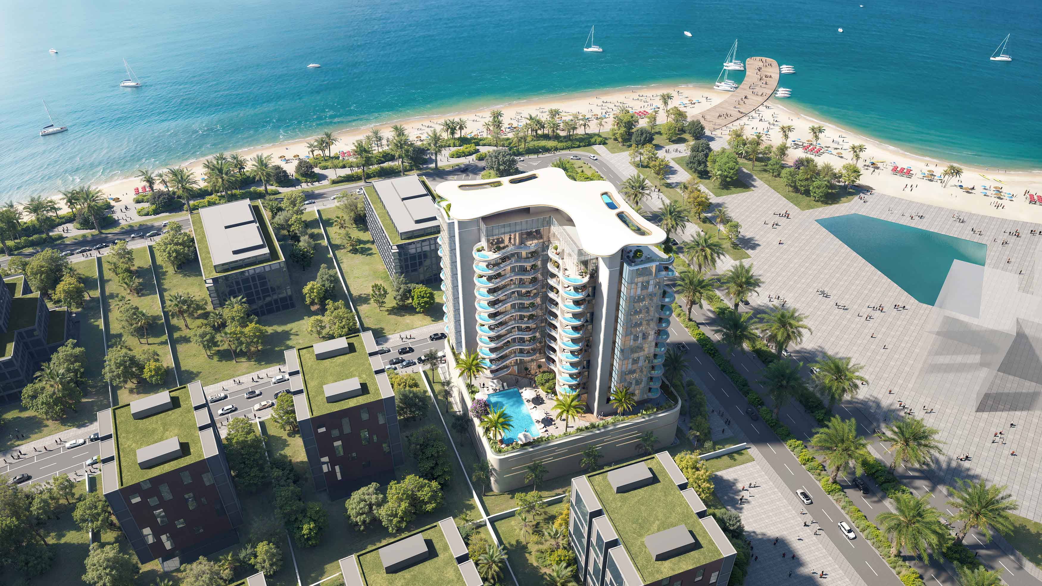 Beach Walk Grand By Imtiaz Aerial view of a coastal area featuring modern buildings, a pool, palm trees, and a sandy beach with boats.